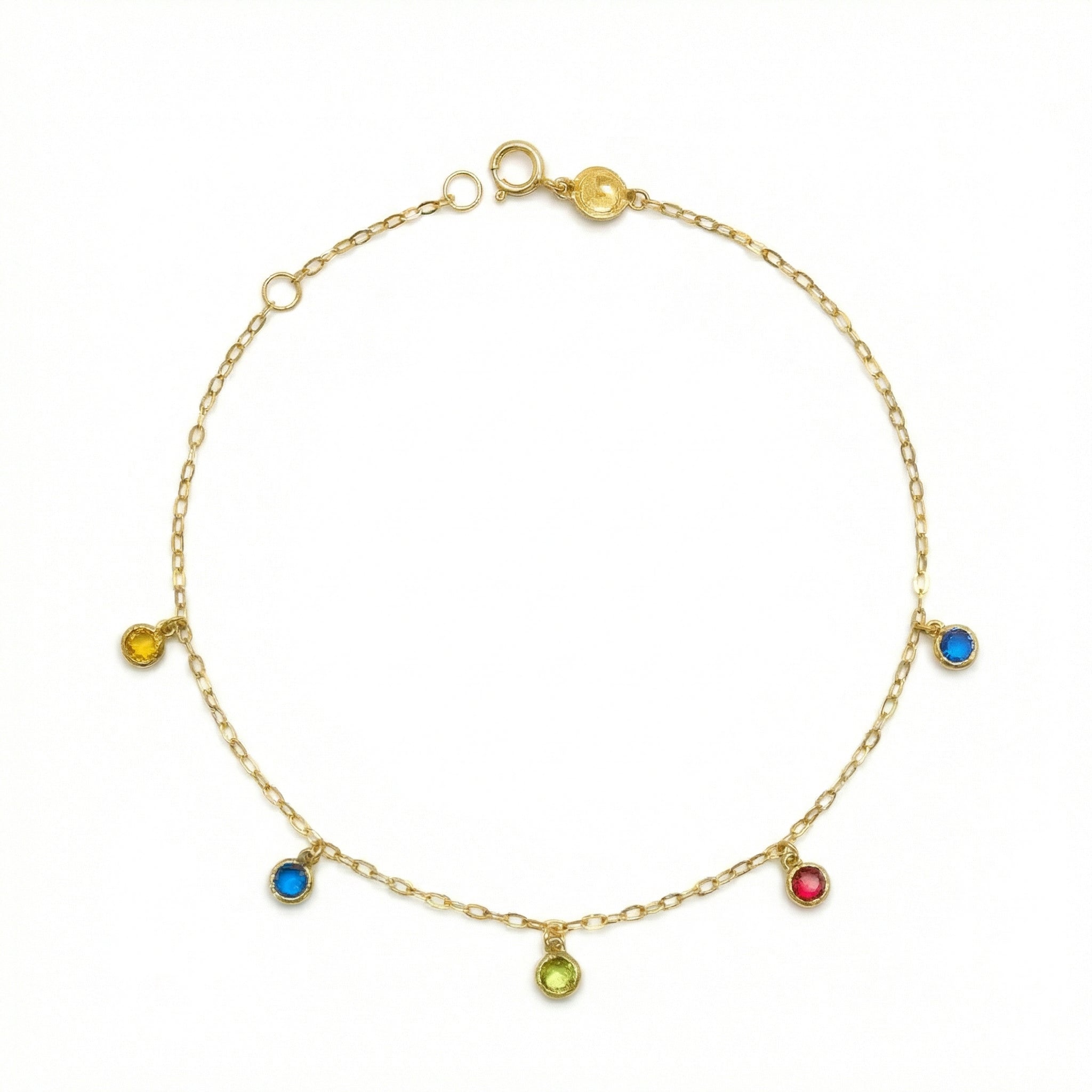 Gold anklet with colorful gemstones on a white background