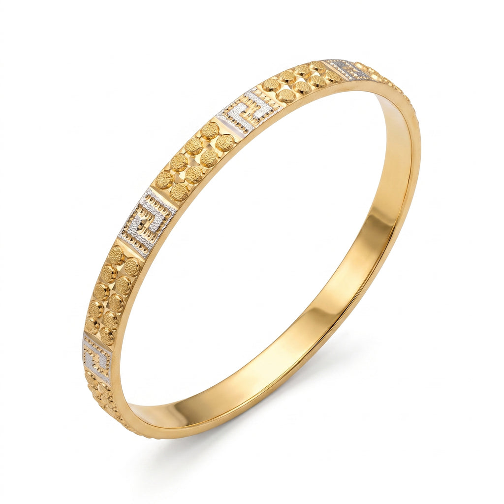 E.Z two-tone patterned solid gold bangle with white gold accents starting from 9.50g, isolated on a pure white background.	غويشة سادة منقوشة بلونين مع تفاصيل من الذهب الأبيض من E.Z تبدأ من 9.50 جم، معزولة على خلفية بيضاء نقية.
