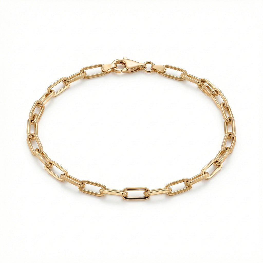 Gold chain bracelet on a white background