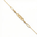 Gold chain necklace on a white background