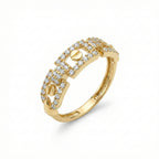 Gold ring with diamond accents on a white background