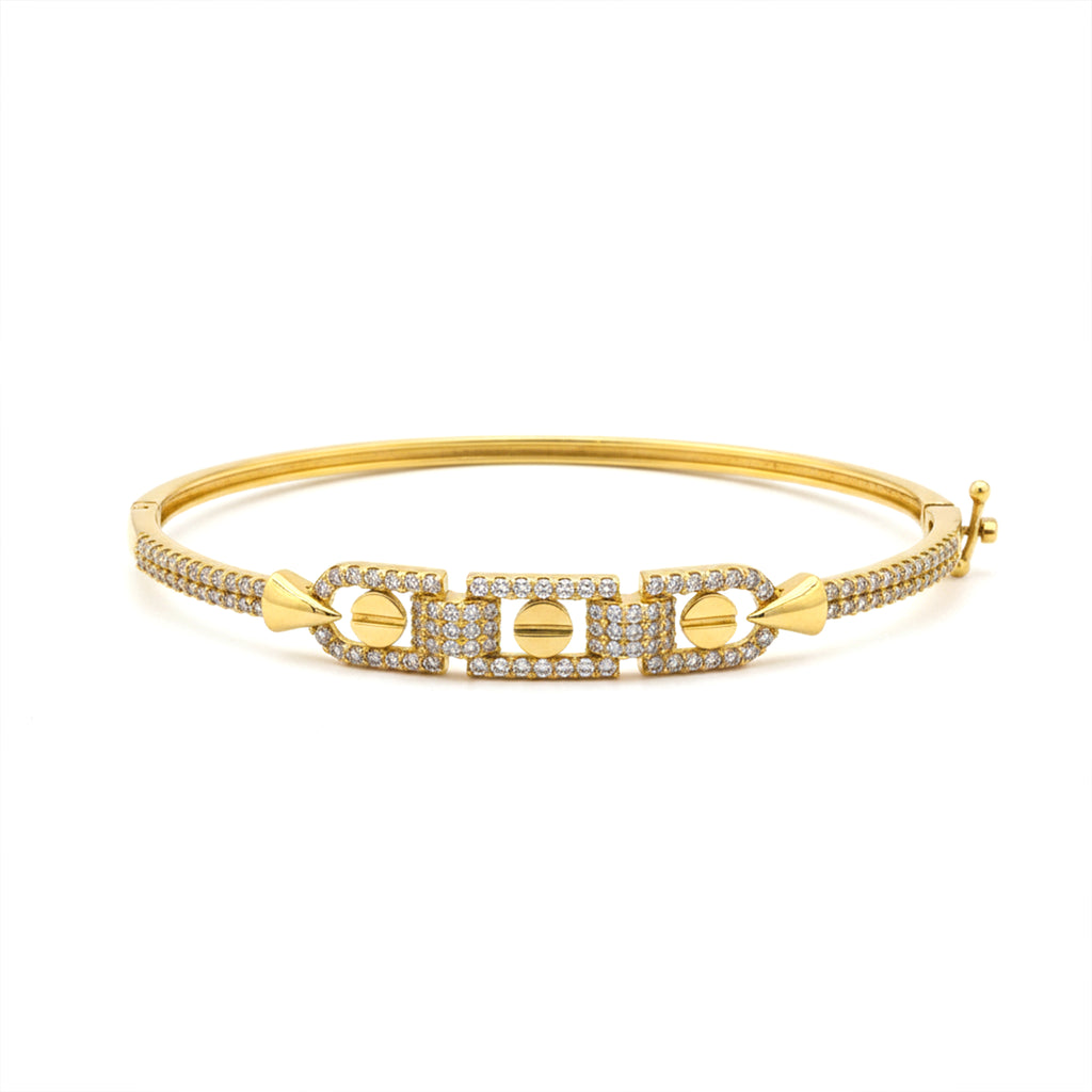 Gold bracelet with diamond accents on a white background