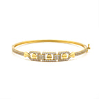 Gold bracelet with diamond accents on a white background