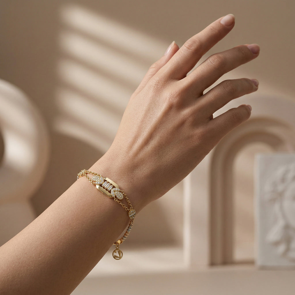 Ultra-realistic luxury editorial photograph of a Lazurde 18k yellow gold bracelet worn on a feminine wrist. The close-up shot highlights the intricate gold reflectivity and diamond brilliance against a soft nude-beige gradient background with artistic shadow play, emphasizing a premium, gallery-like aesthetic.