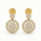 Gold earrings with circular designs and clear stones on a white background