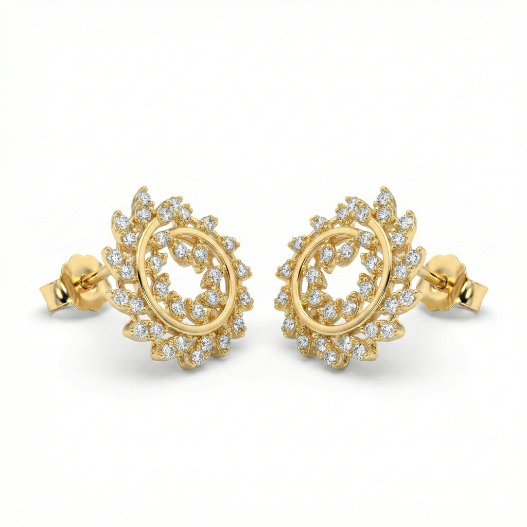 Gold earrings with diamond accents on a white background