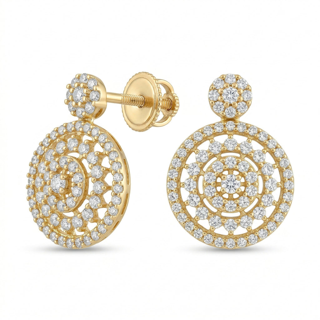 A high-resolution e-commerce product shot of Lazurde 18k yellow gold stud earrings on a pure white background, featuring a highly detailed, multi-layered circular design fully encrusted with radiant clear stones.