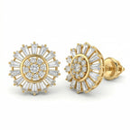 A high-resolution e-commerce product photograph of Lazurde 18k yellow gold stud earrings on a pure white background, showcasing a brilliant sunburst design with a center cluster of round stones surrounded by a halo of baguette-cut stones.
