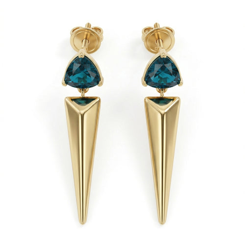 A pair of Lazurde 18k yellow gold earrings featuring a trillion-cut teal gemstone set above a long, polished gold spike pendant, isolated on a pure white background in a 4k product shot.
