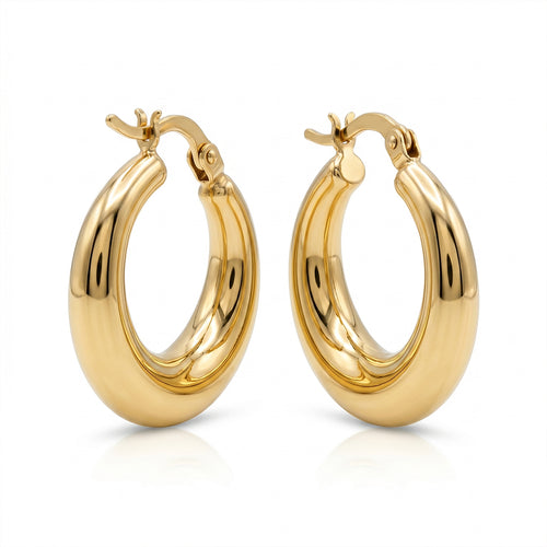 A symmetrical studio product photograph of a pair of thick, polished gold hoop earrings. They are isolated on a pure white background with their hinges and clasps clearly visible at the top, and a subtle reflection below.