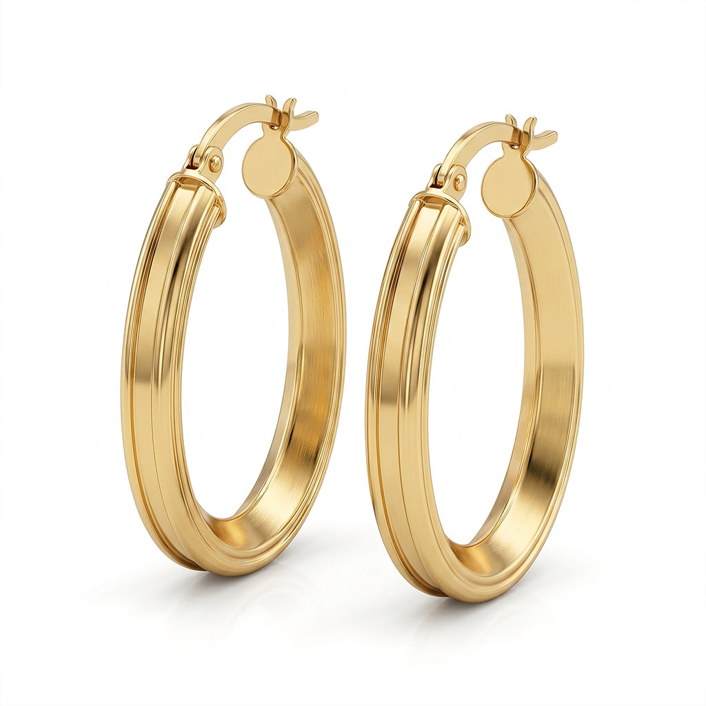 18k yellow gold elongated oval-grooved hoop earrings, as a pair, on a seamless pure white background.