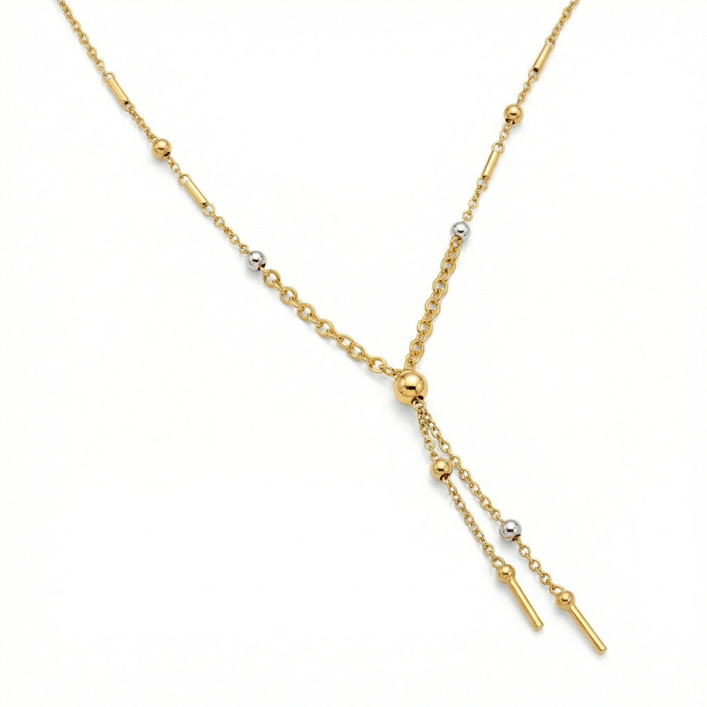 Gold necklace with small beads and bars on a white background