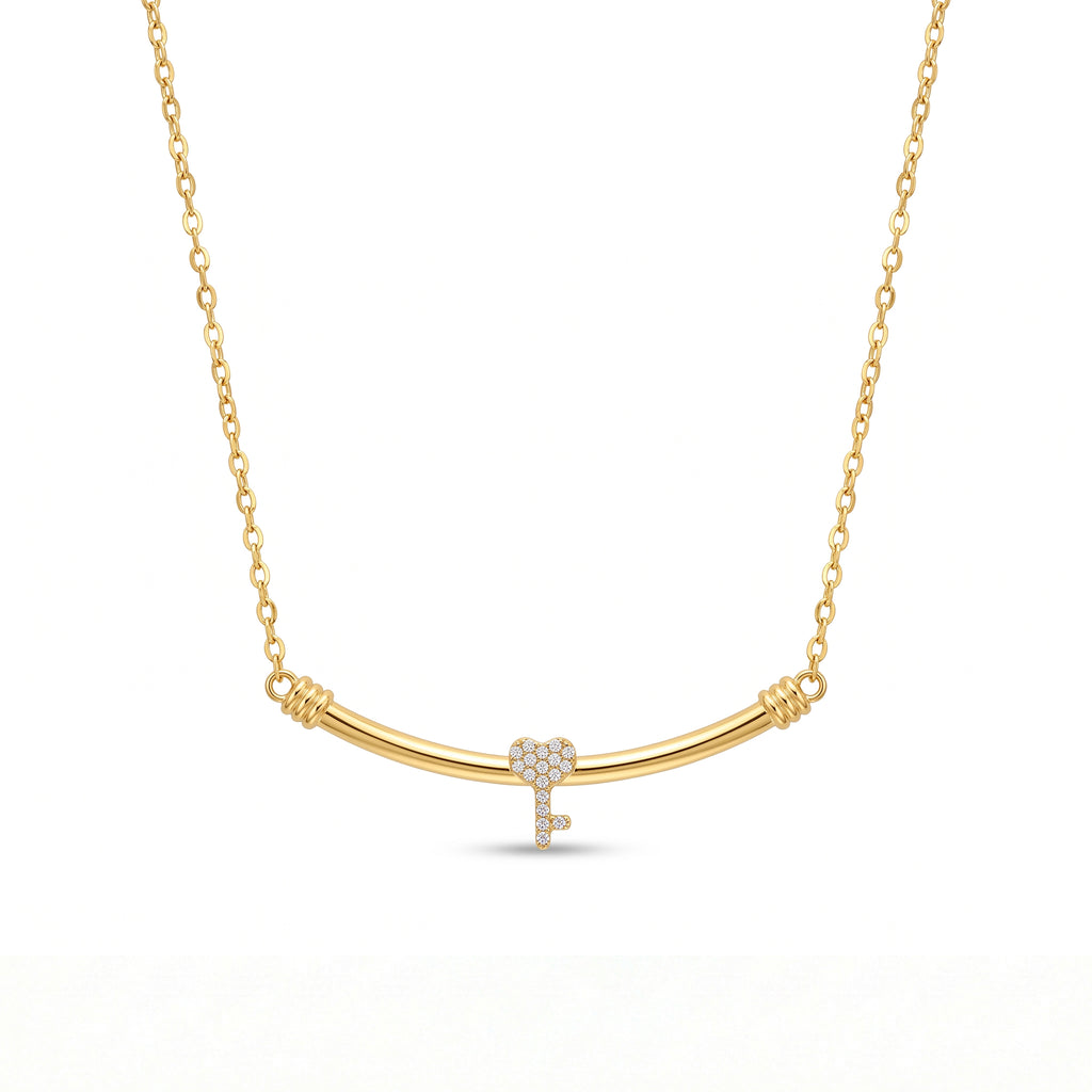 18k yellow gold heart key pendant necklace by Remas Gold on a pure white background, 3.97 gm.
سلسلة بدلاية مفتاح وقلب دهب عيار 18 من ريماس جولد على خلفية بيضا، 3.97 جرام