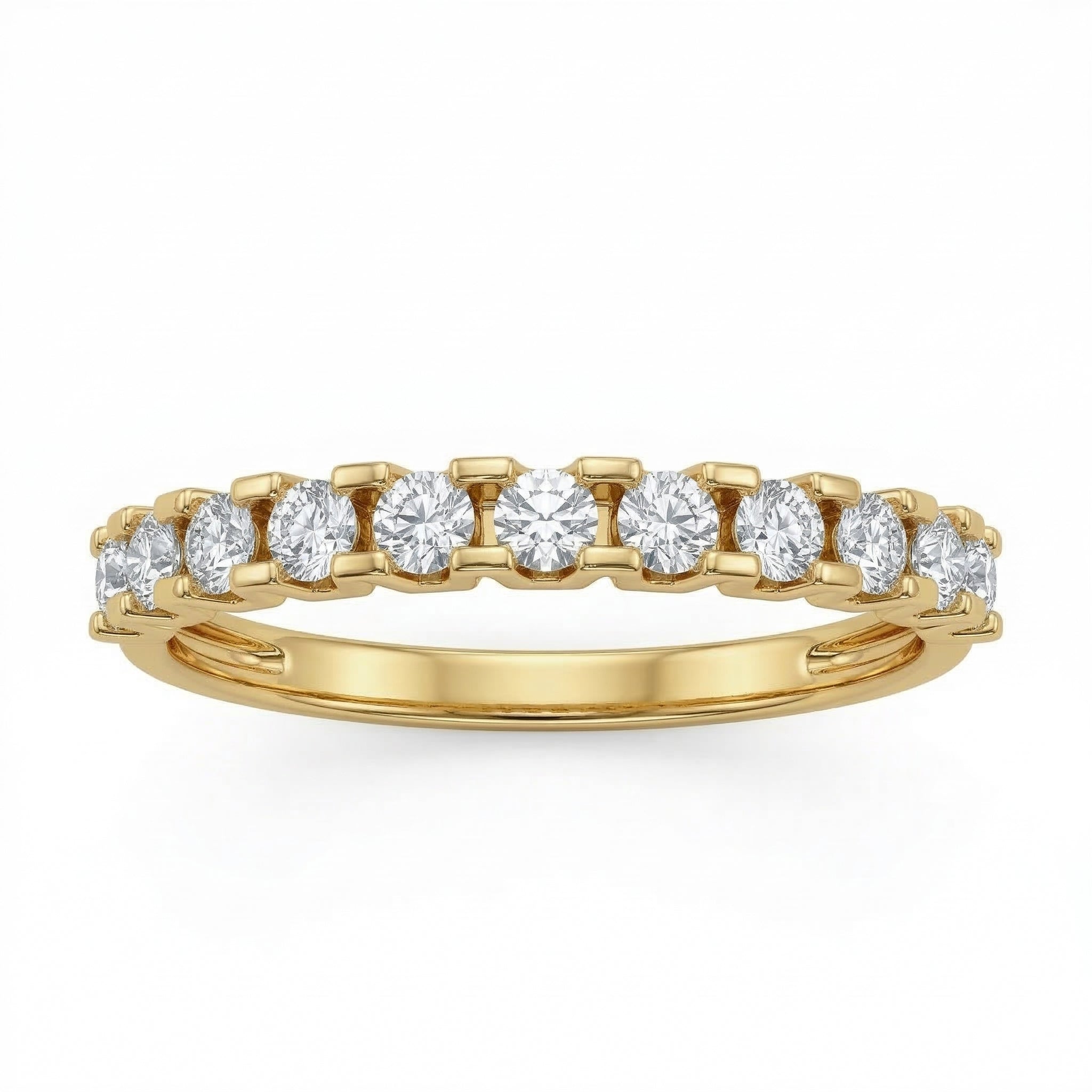 Front view of a Fine Gold 18k yellow gold wedding promise ring lying flat on a pure white background. The ring belongs to The Forever Edit category and features a delicate half-eternity band set with 11 brilliant round stones.
