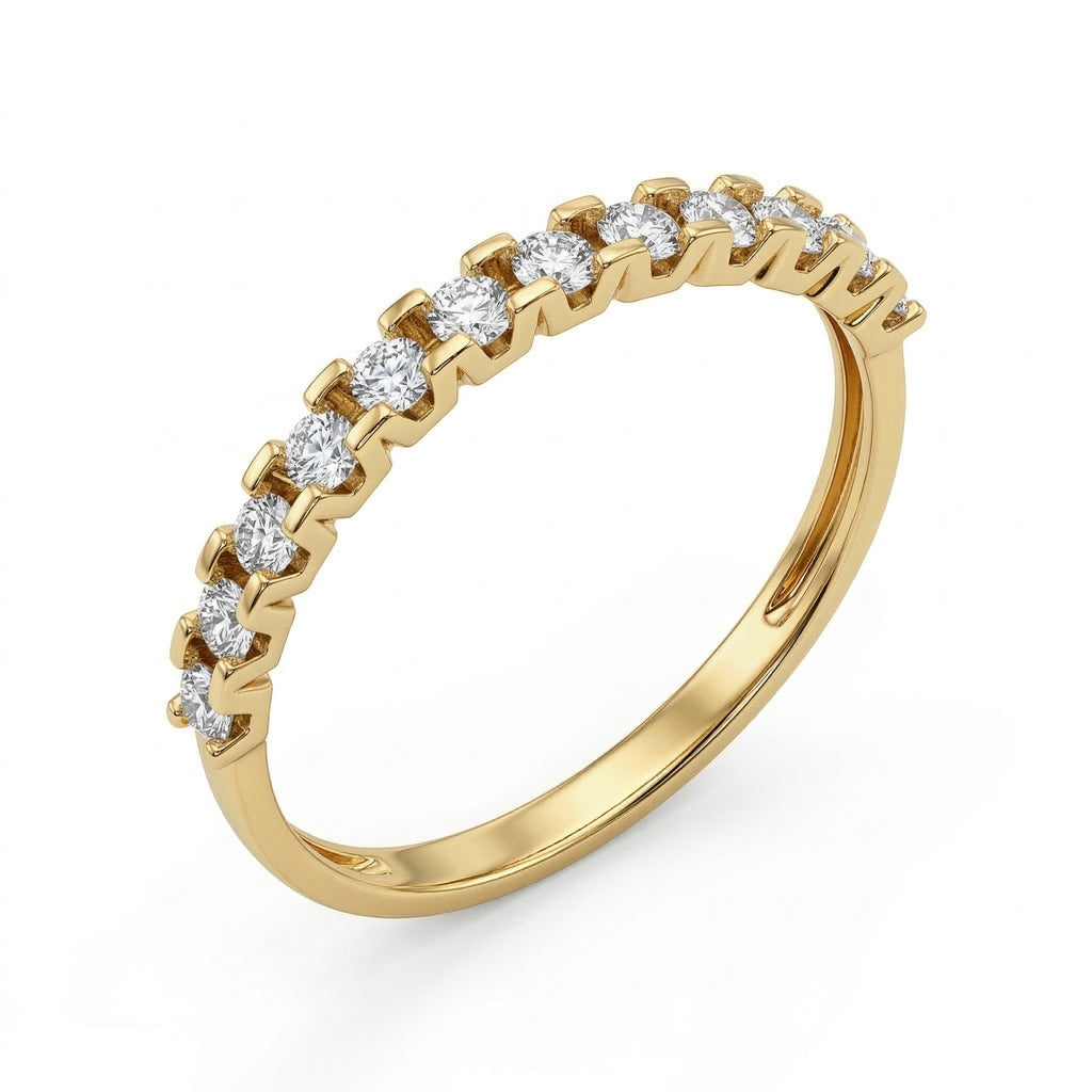 Front view of a Fine Gold 18k yellow gold wedding promise ring lying flat on a pure white background. The ring belongs to The Forever Edit category and features a delicate half-eternity band set with 11 brilliant round stones.