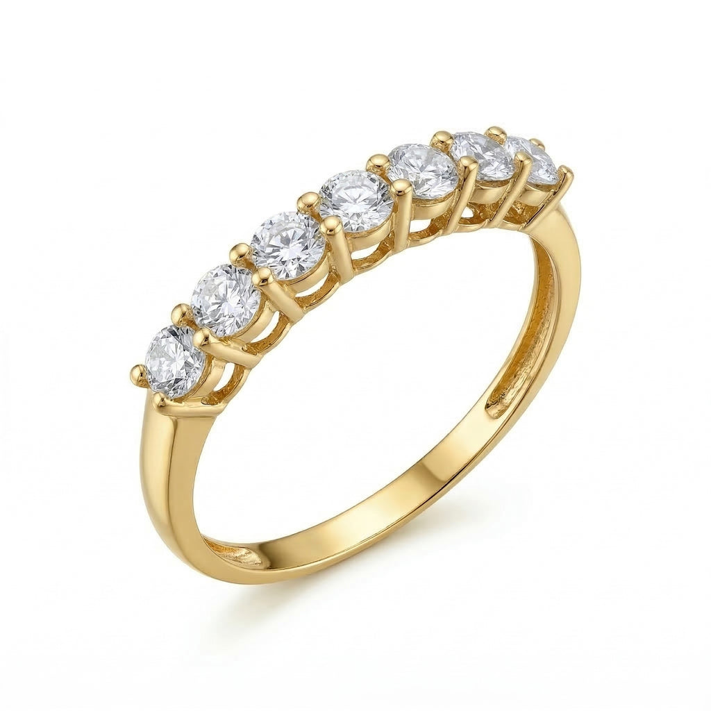 King Gold 18k yellow gold promise ring from The Forever Edit collection, featuring seven round-cut stones set in a row, displayed standing upright at a slight angle on a pure white background