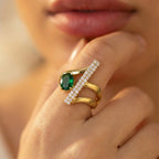 Modern 18K Yellow Gold Statement Ring with Oval Emerald Green Stone & Vertical Pave Bar