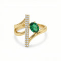 Modern 18K Yellow Gold Statement Ring with Oval Emerald Green Stone & Vertical Pave Bar