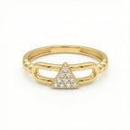 Gold ring with a diamond triangle design on a white background