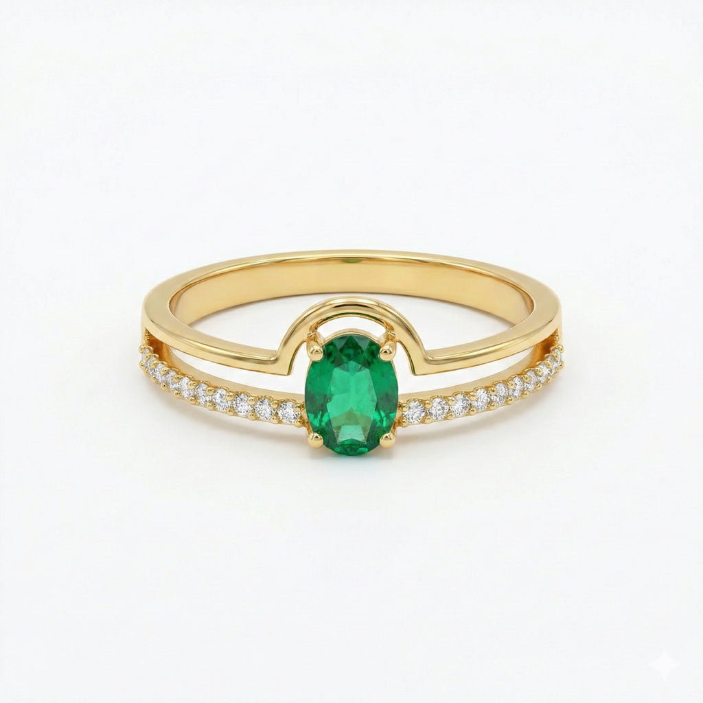 Gold ring with a green gemstone and small white stones on a white background