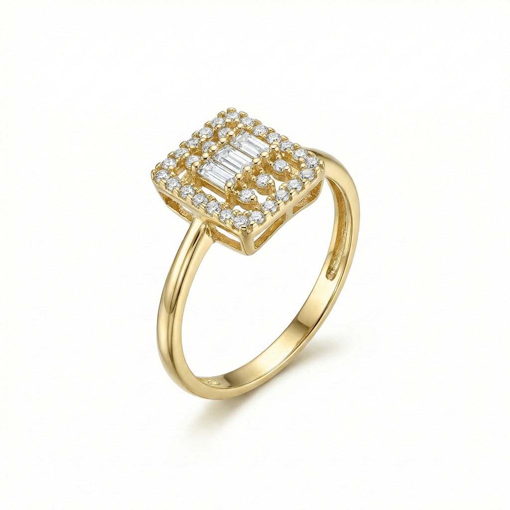 Gold ring with diamond accents on a white background