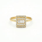 Gold ring with diamond accents on a white background