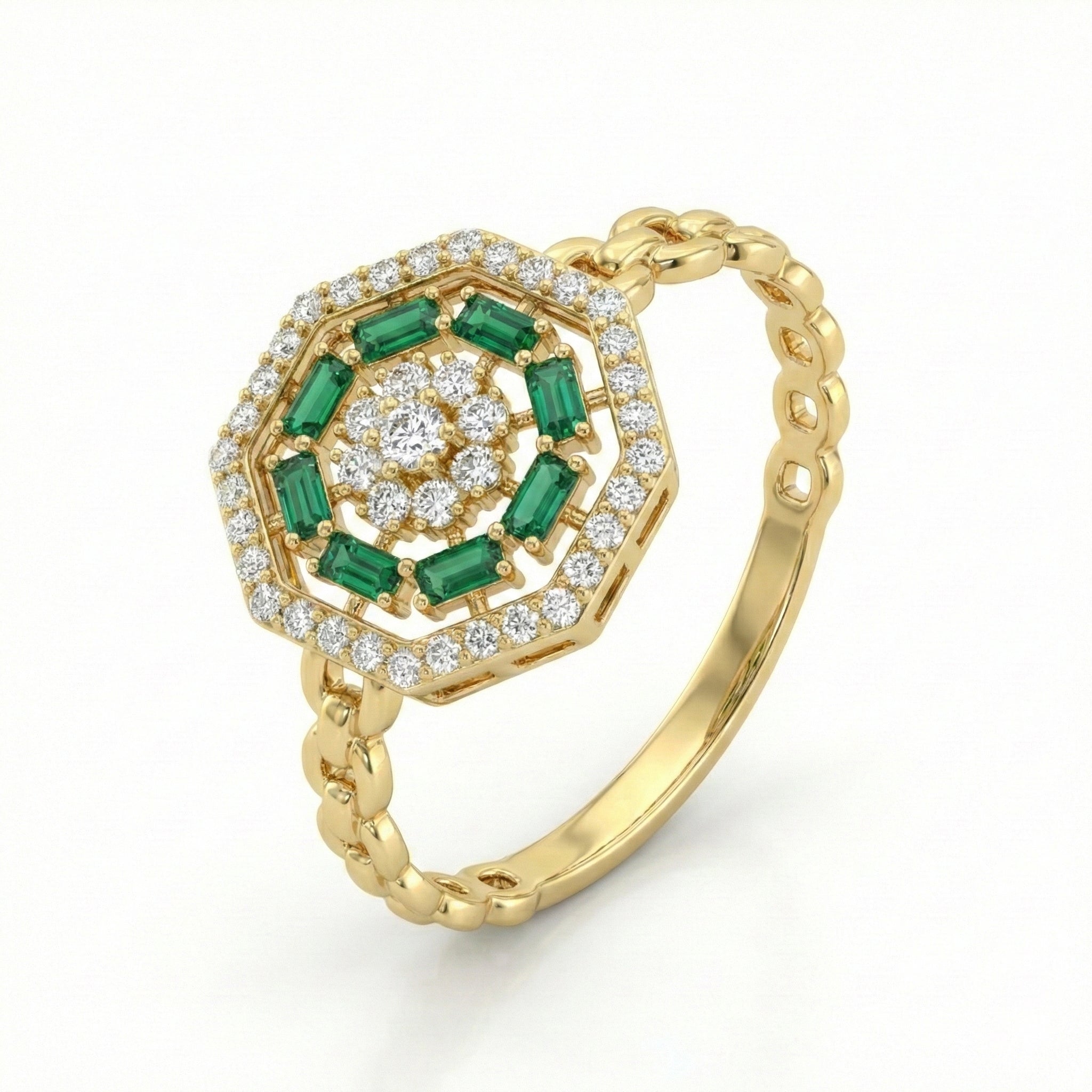 Gold ring with emerald and diamond design on a white background