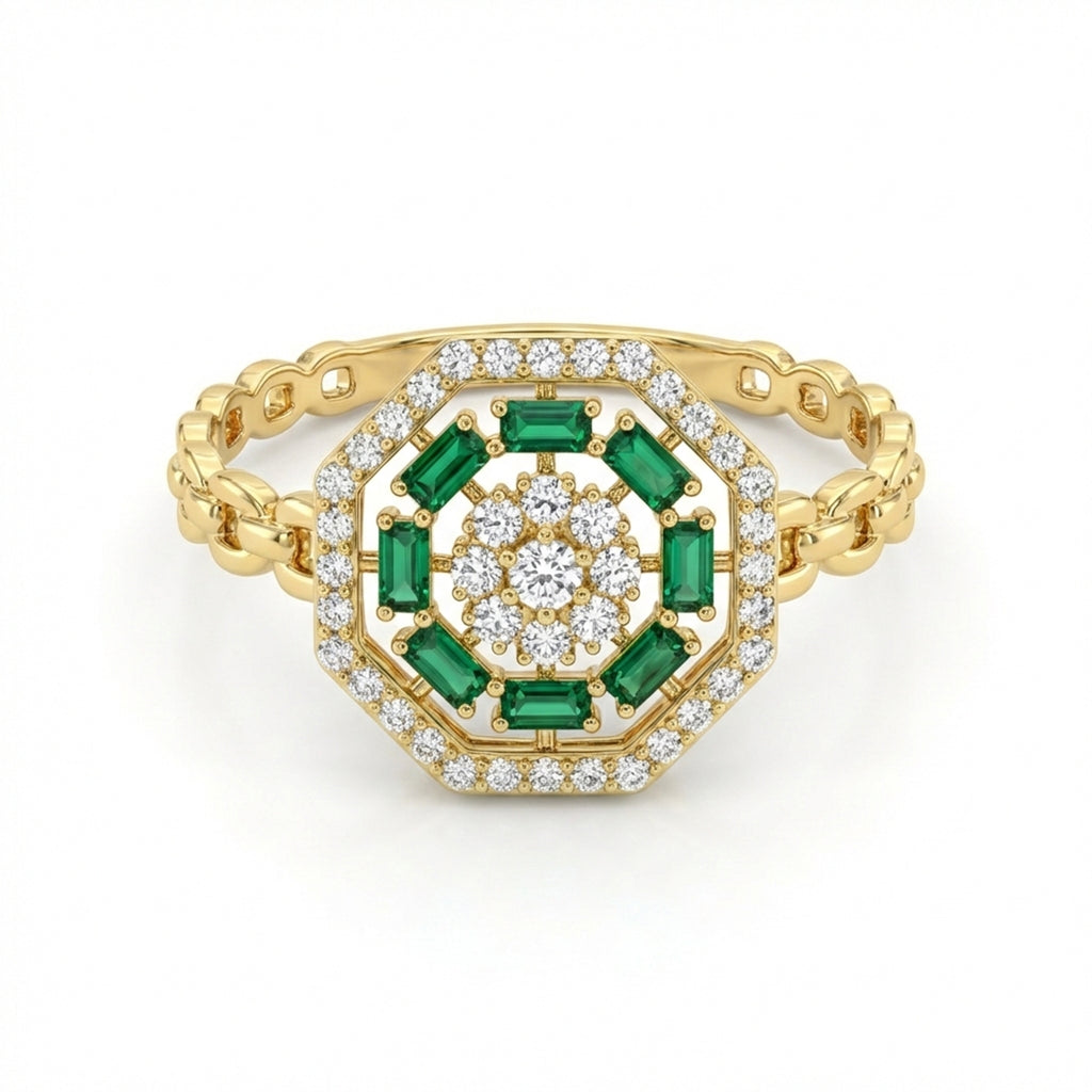 Gold ring with emeralds and diamonds on a white background