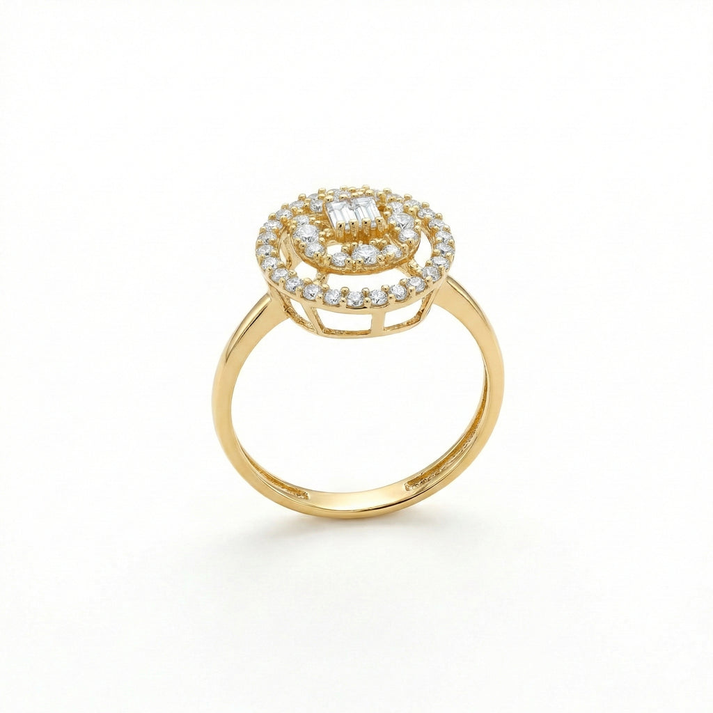 Gold ring with diamond accents on a white background