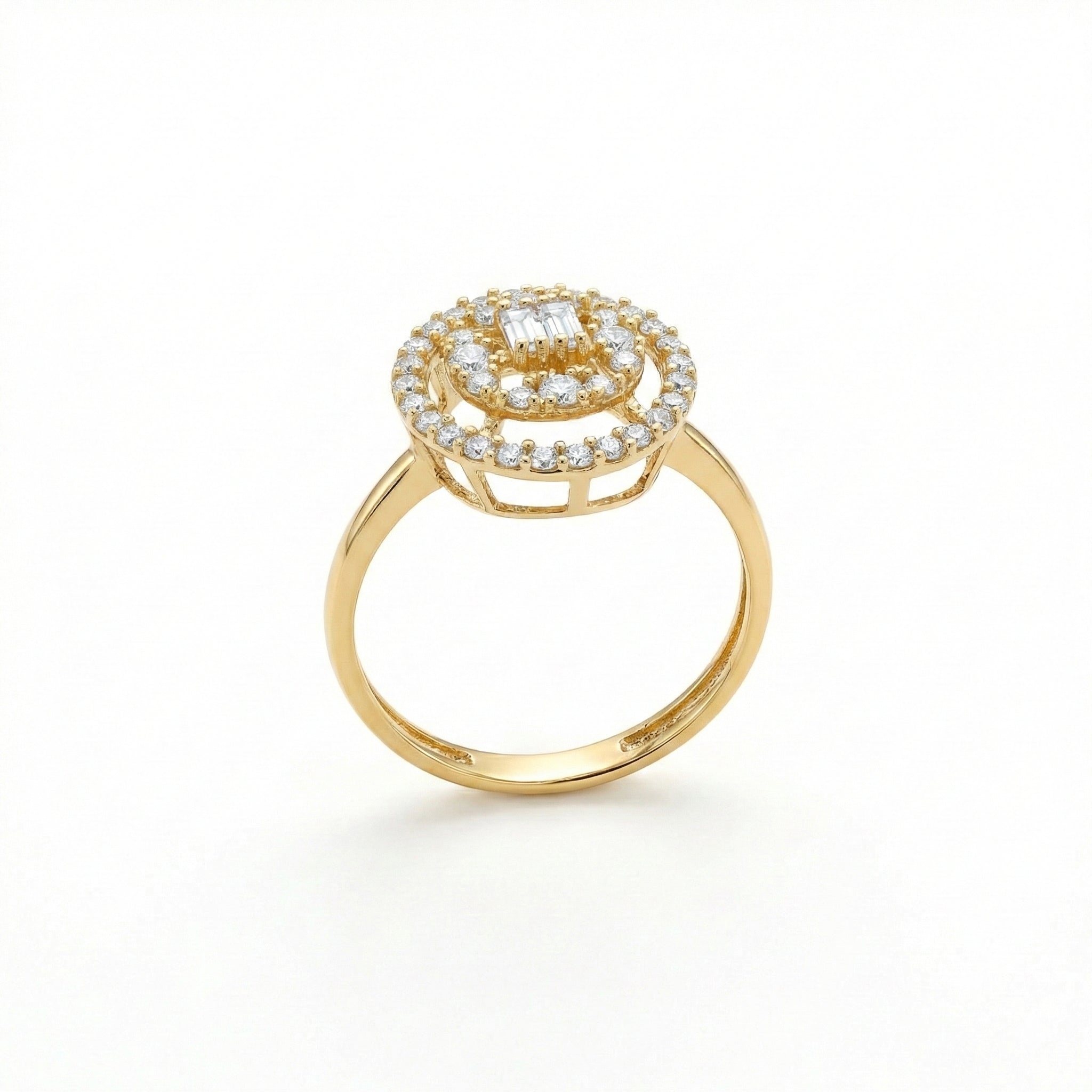 Gold ring with diamond accents on a white background