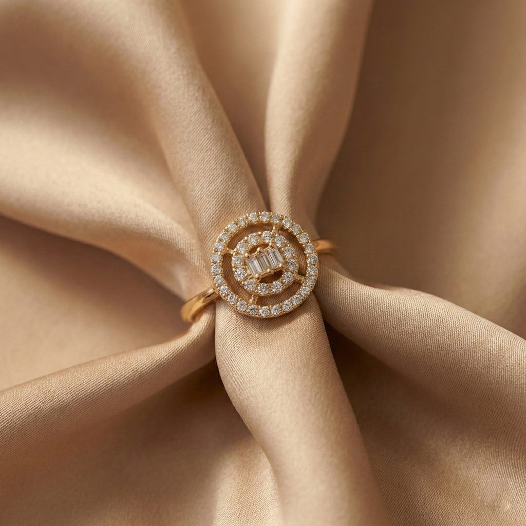Gold ring with diamonds on a beige fabric background
