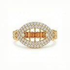 Gold ring with diamond accents on a white background