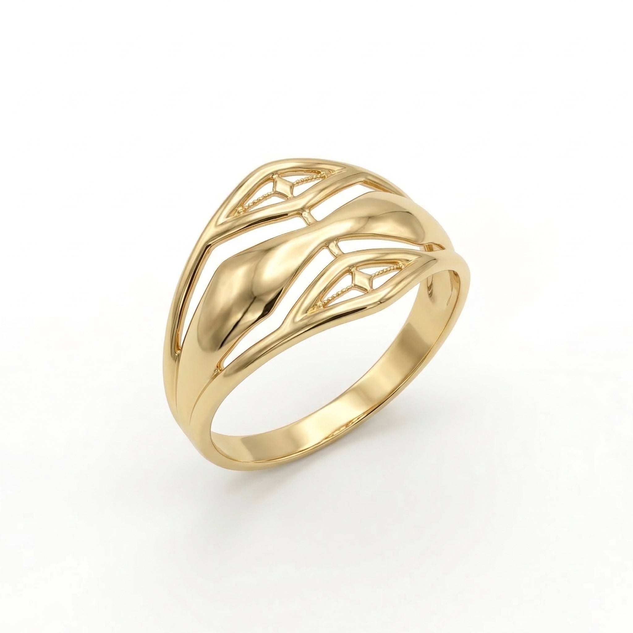 A high-resolution product shot of an Andria 18k yellow gold ring standing upright against a pure white background, highlighting its intricate, multi-band open-work design and polished finish.