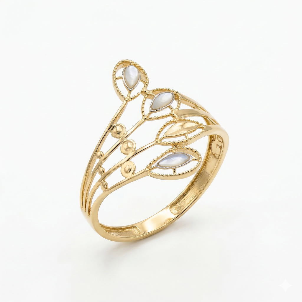 Andria 18k yellow gold ring featuring a delicate botanical branch design with marquise-shaped leaves, standing upright at a three-quarter angle on a pure white background.