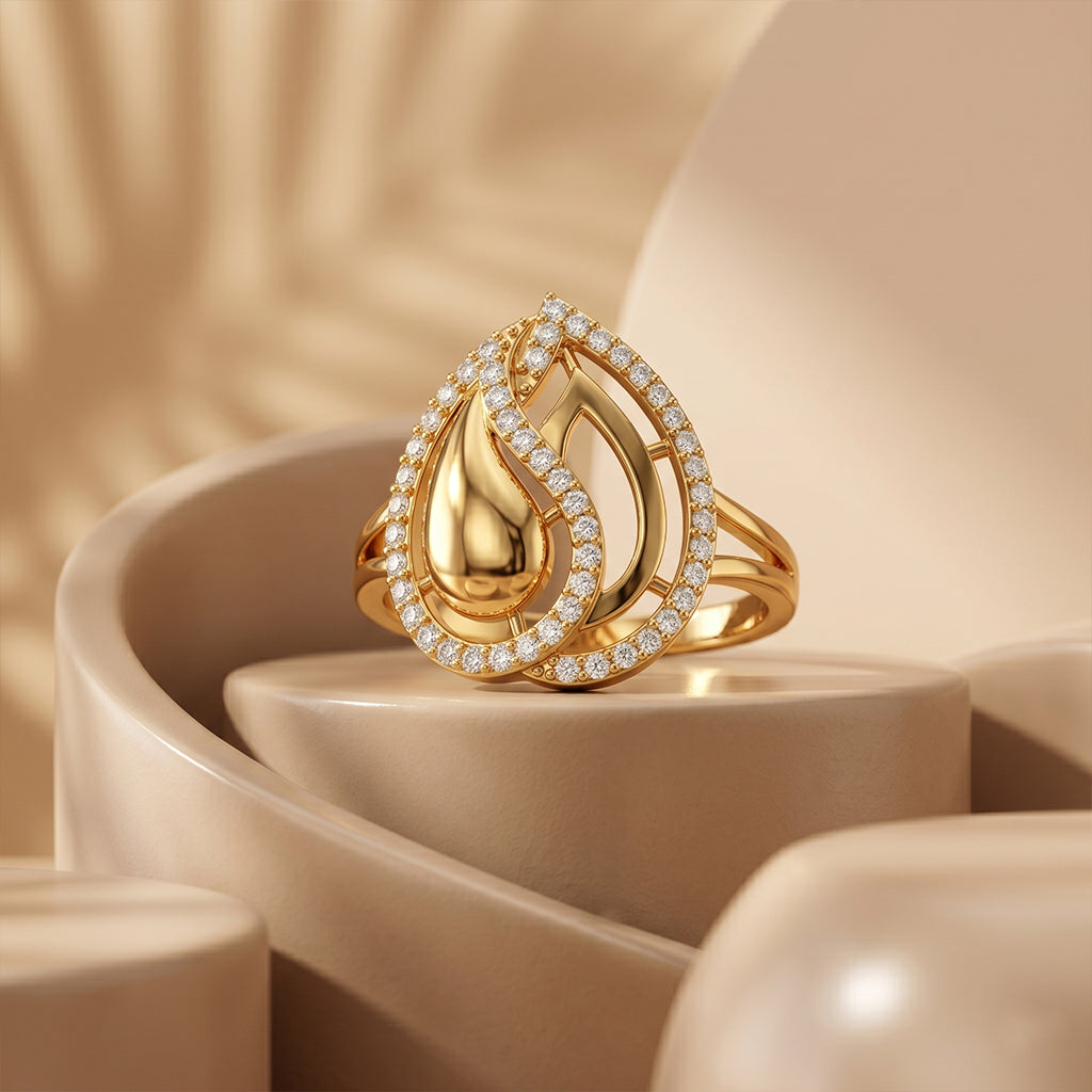 Fine Gold 18k yellow gold teardrop ring displayed artistically on smooth, neutral beige sculptural pedestals under soft luxury studio lighting. خاتم ذهب عيار 18 من فاين جولد بتصميم قطرة الماء معروض بأسلوب فني فاخر على منصات بيج ناعمة تحت إضاءة استوديو دافئة.