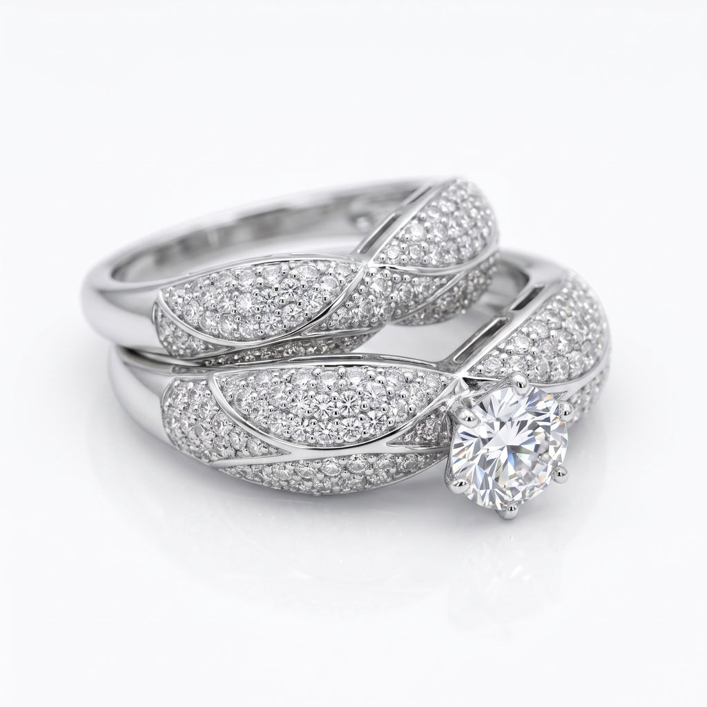L'azurde 18k white gold twin ring set weighing 10.36g featuring sparkling simulated stones on a pure white background.	طقم خواتم توينز من لازوردي ذهب أبيض عيار 18 بوزن 10.36 جرام مع أحجار لامعة على خلفية بيضاء نقية.