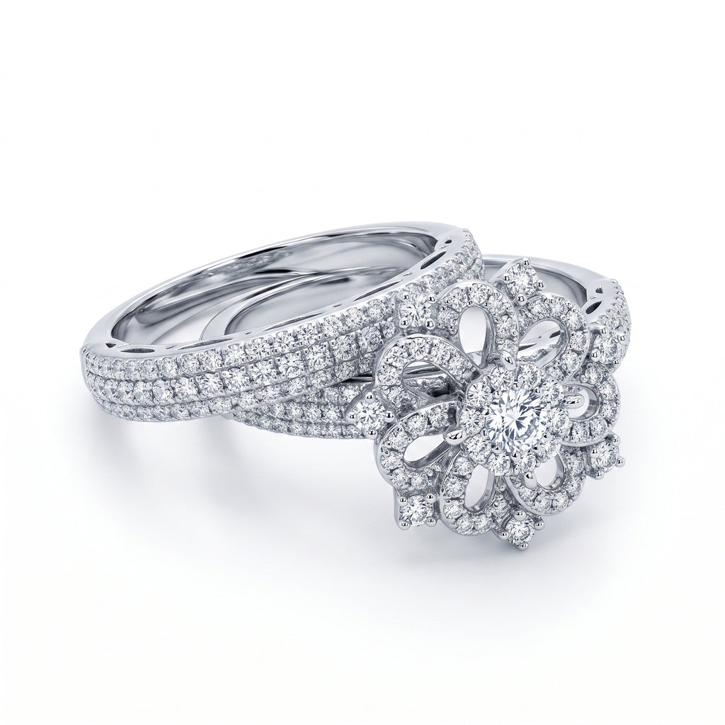 Egypt Gold 7.61g white gold twin ring set with a floral centerpiece and sparkling simulated stones on a pure white background.	طقم خواتم توينز ذهب أبيض 7.61 جرام من إيجيبت جولد بتصميم وردة وأحجار براقة على خلفية بيضاء نقية.