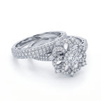 Egypt Gold 7.61g white gold twin ring set with a floral centerpiece and sparkling simulated stones on a pure white background.	طقم خواتم توينز ذهب أبيض 7.61 جرام من إيجيبت جولد بتصميم وردة وأحجار براقة على خلفية بيضاء نقية.