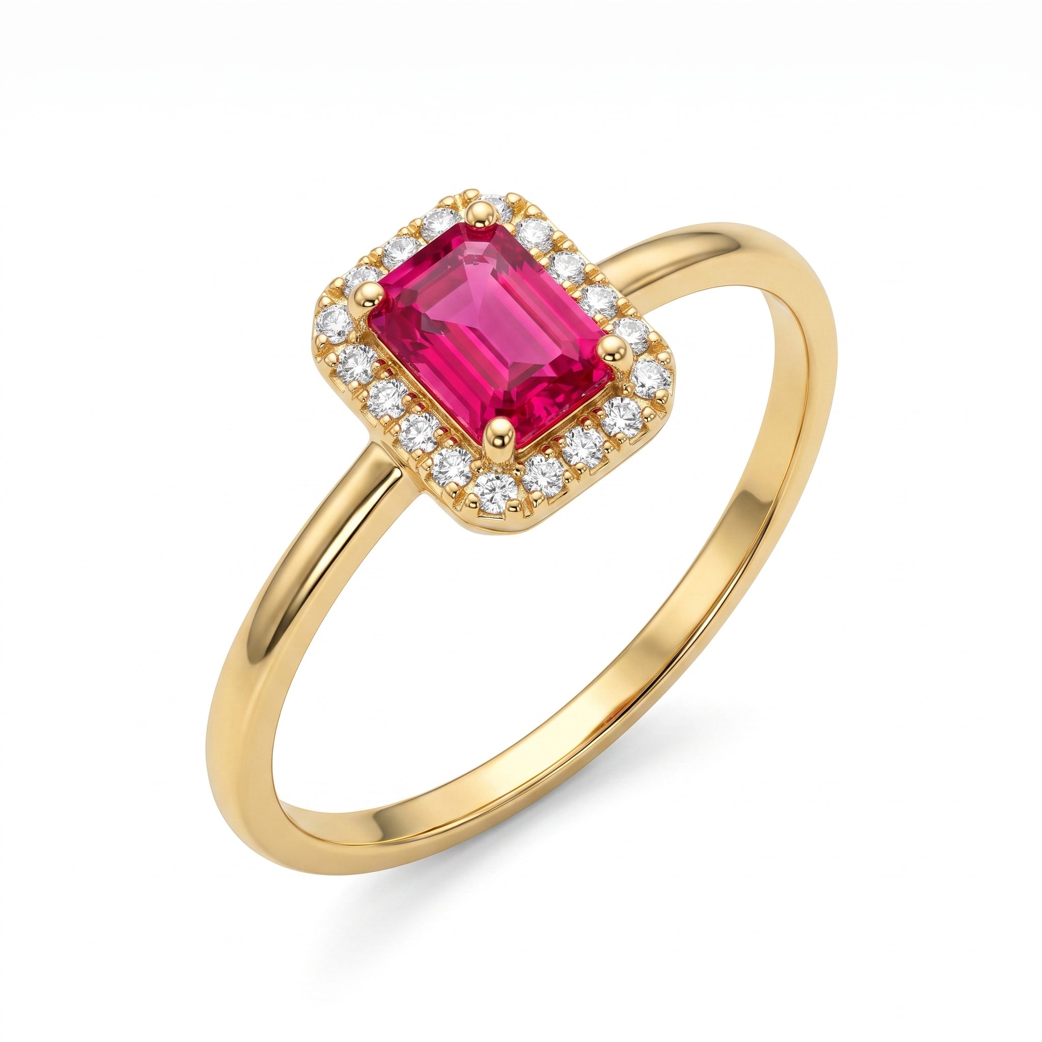 King Gold 0.96g delicate gold ring with a rectangular pink center stone and white stone halo, isolated on a pure white background.	خاتم ذهب رقيق بوزن 0.96 جم بفص وردي مستطيل وأحجار بيضاء من كينج جولد، معزول على خلفية بيضاء نقية.
