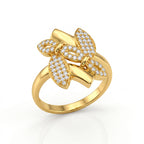 Fine Gold floral pave ring on a pure white background.	خاتم فاين جولد ذهب بتصميم زهرة مرصعة على خلفية بيضاء نقية.