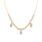 Gold necklace with diamond pendants on a white background