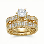 Gold ring with diamond accents on a white background