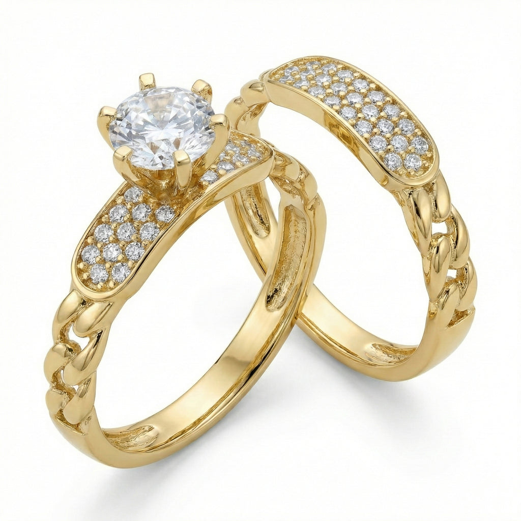 Two gold rings with diamond accents on a white background
