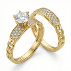 Two gold rings with diamond accents on a white background