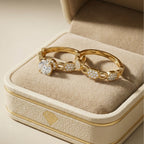 Gold bracelet with heart-shaped diamonds on a beige jewelry box