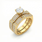 Gold ring with a large diamond and smaller diamonds on a white background