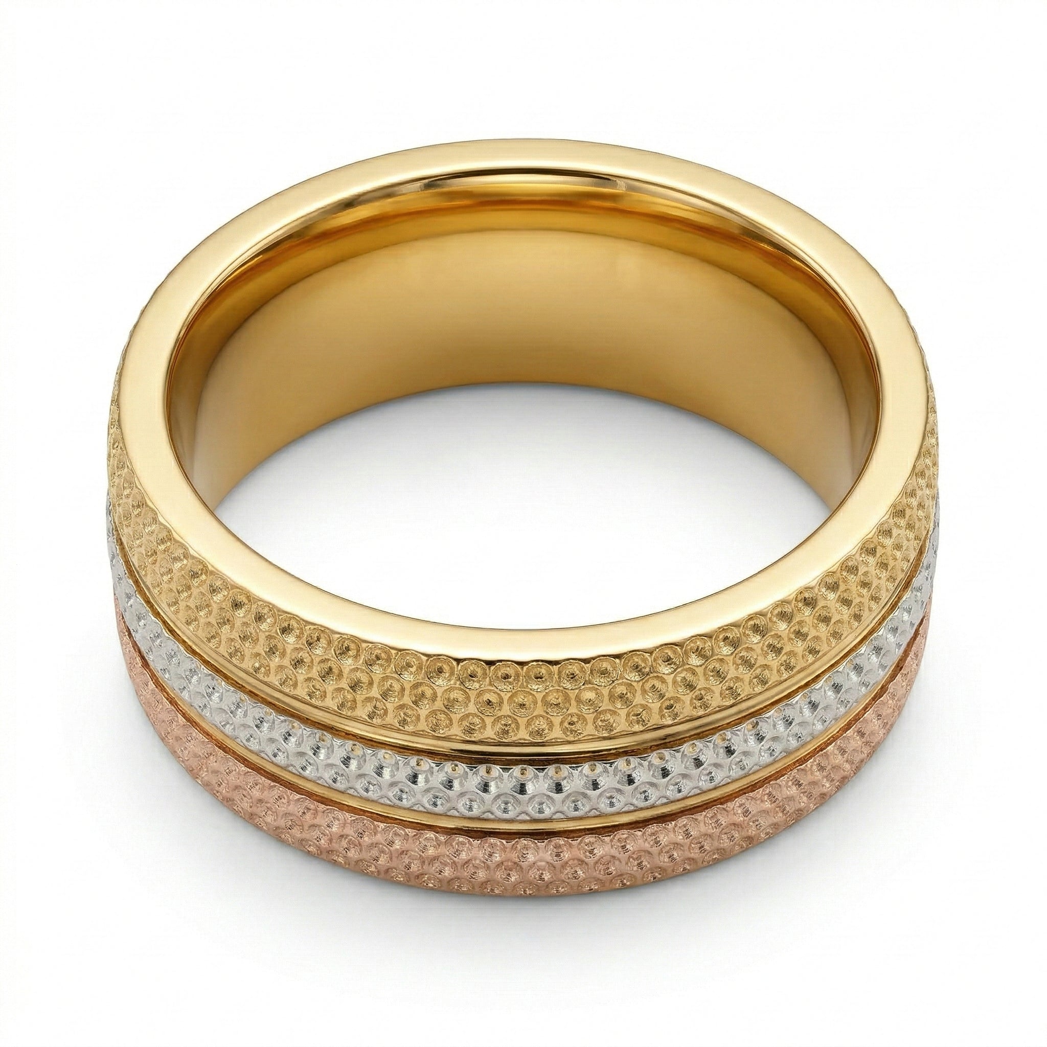Gold ring with textured design on a white background