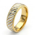 Gold and silver ring with a geometric pattern on a white background