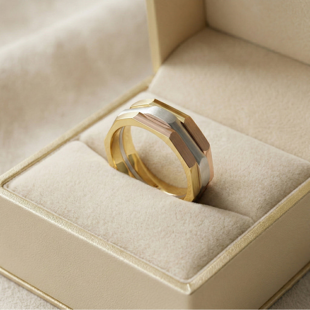 three-tone gold ring in a jewelry box